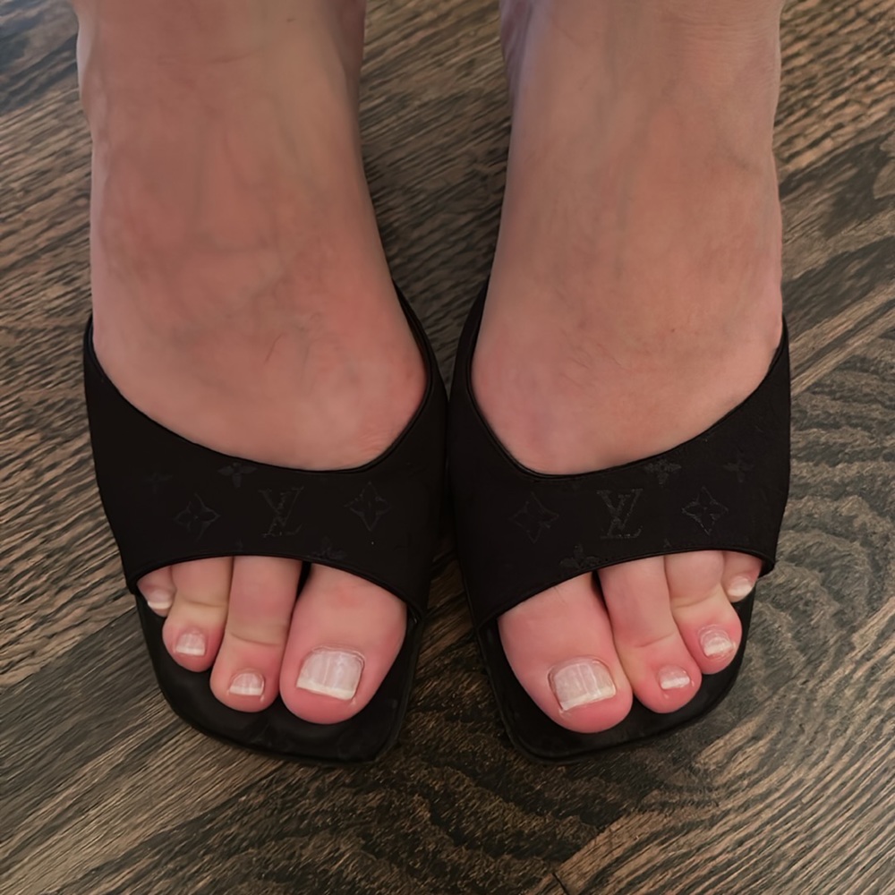Black satin Louis Vuitton kitten heels in a 41, I’m an American size 9.5.